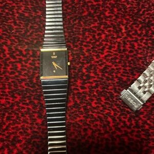 Women’s citizen watch black and gold worn a coupler time